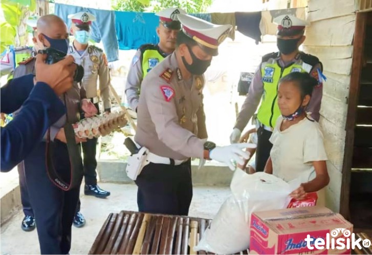 Polres Bombana Bagi Sembako dan Donor Darah