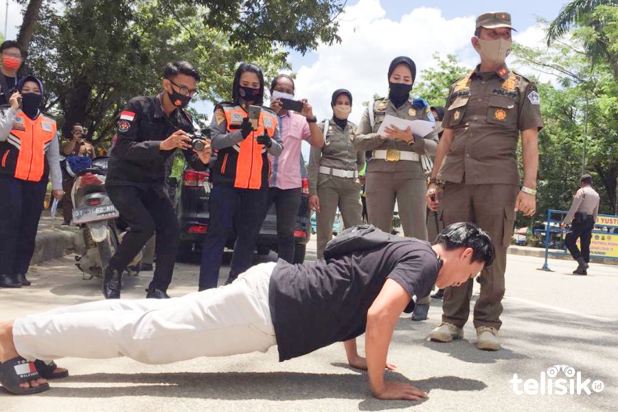 Tak Pakai Masker, Dihukum Push Up