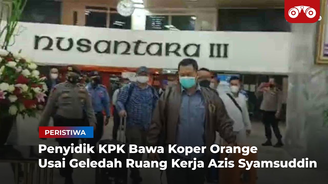 Video: Penyidik KPK Bawa Koper Orange Usai Geledah Ruang Kerja Azis Syamsuddin