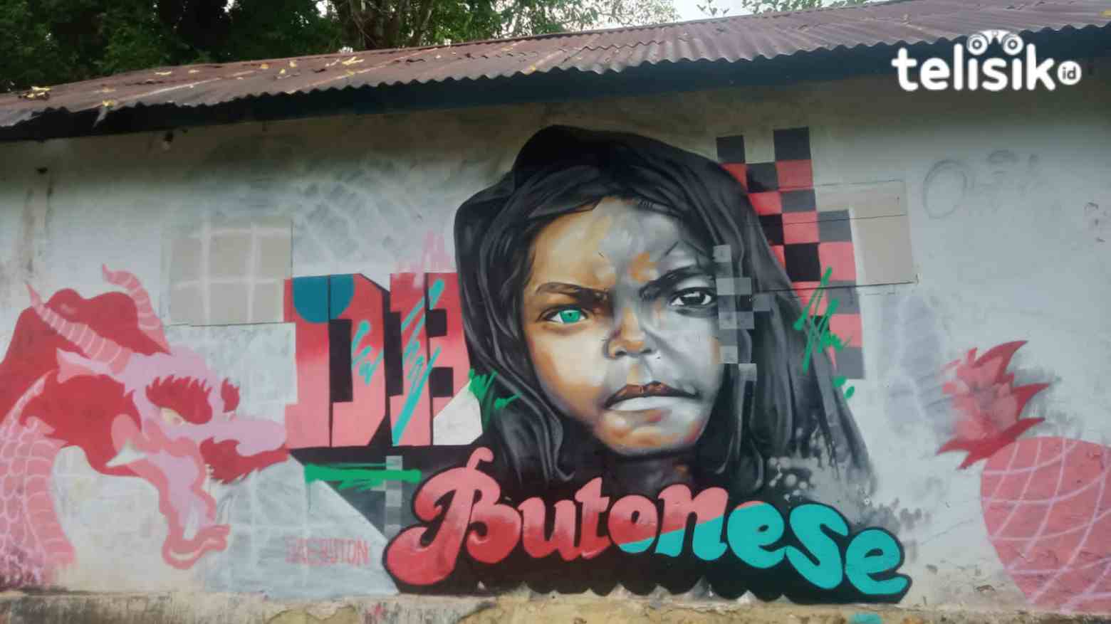 Seniman Asal Baubau Buat Mural Anak Bermata Biru