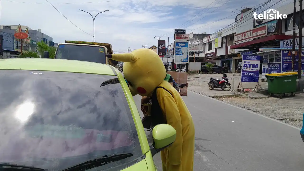 Foto Humanis: Derita Kostum Ceria